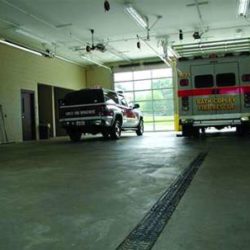 A sample drain system installed in ambulance garage setting