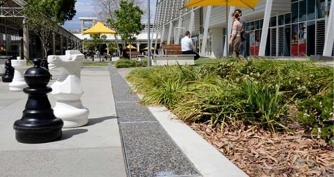 A sample EcoPanel-Linear drain system installed in a city sidewalk